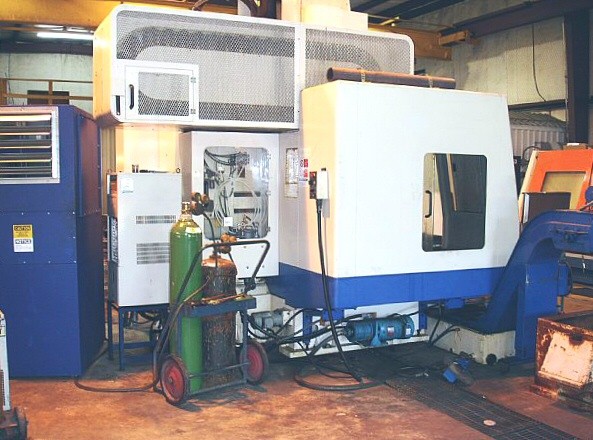 http://www.machinetools247.com/images/machines/11396-Daewoo DMV-650 a.jpg