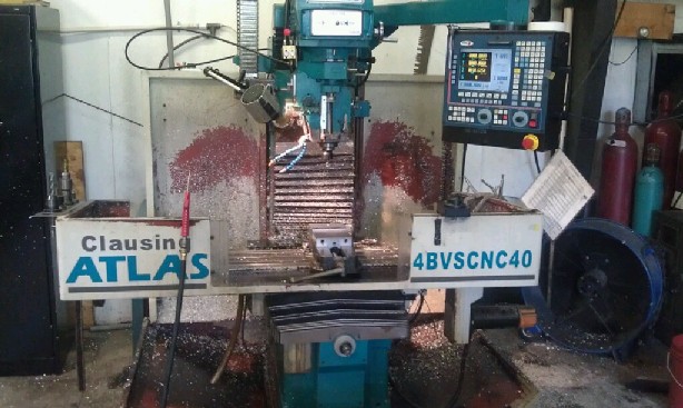 http://www.machinetools247.com/images/machines/12817-Clausing-Atlas 4BVS CNC 40 a.jpg