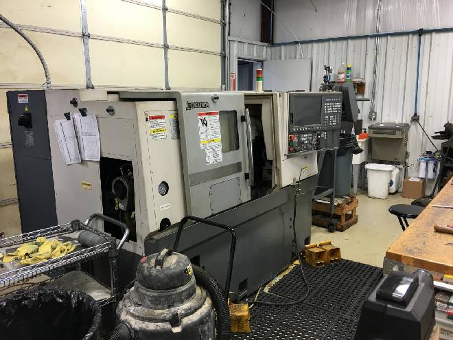 http://www.machinetools247.com/images/machines/15761-Okuma Genos L-200 EM 1.jpg