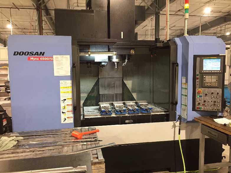 http://www.machinetools247.com/images/machines/16092-Doosan Mynx-6500 - 50.jpg