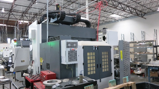 http://www.machinetools247.com/images/machines/16150-YCM DCV-2012B 4.jpg