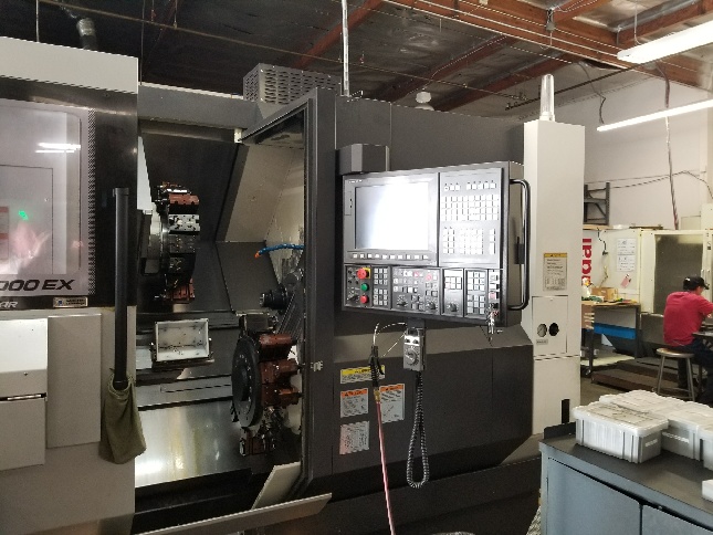 http://www.machinetools247.com/images/machines/16245-Okuma LT-2000 EX MY 2.jpg