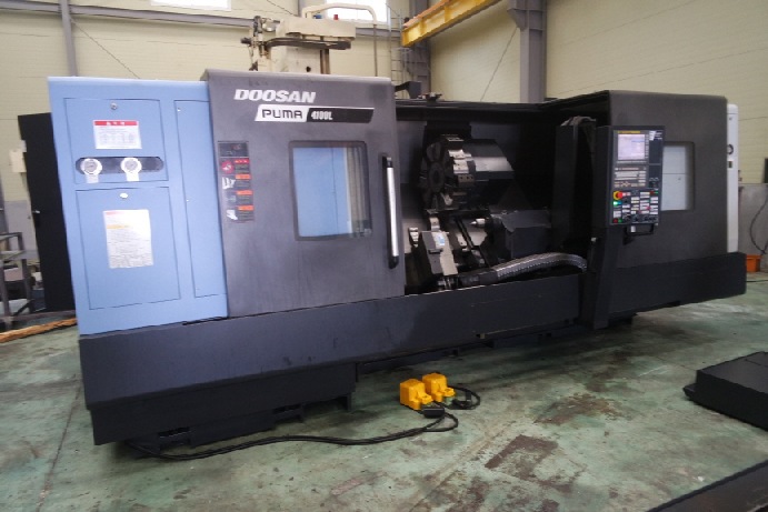 http://www.machinetools247.com/images/machines/16360-Doosan Puma-4100 LB 4.jpg