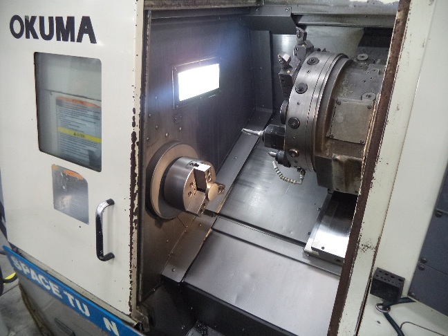 http://www.machinetools247.com/images/machines/16561-Okuma LB-300 M 1.jpg