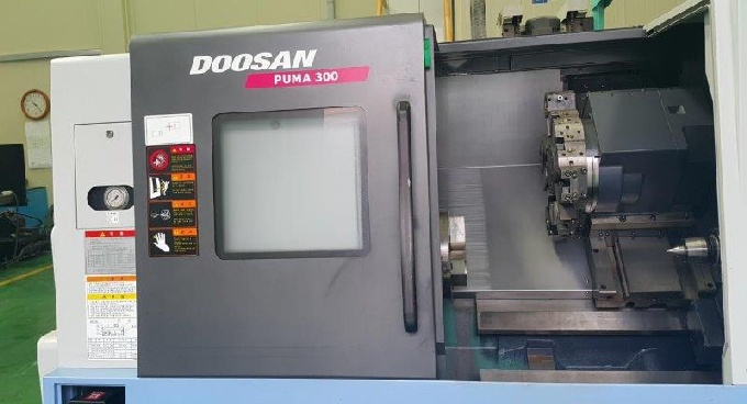 http://www.machinetools247.com/images/machines/16628-Doosan Puma-300 C 1.jpg