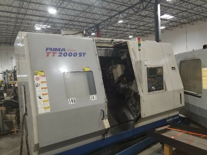 http://www.machinetools247.com/images/machines/16668-Doosan Puma-TT-2000 SY 1.jpg