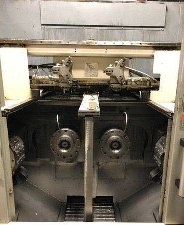 http://www.machinetools247.com/images/machines/16694-Okuma 2SP-150H 2.jpg