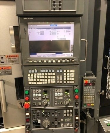 http://www.machinetools247.com/images/machines/16694-Okuma 2SP-150H 3.jpg